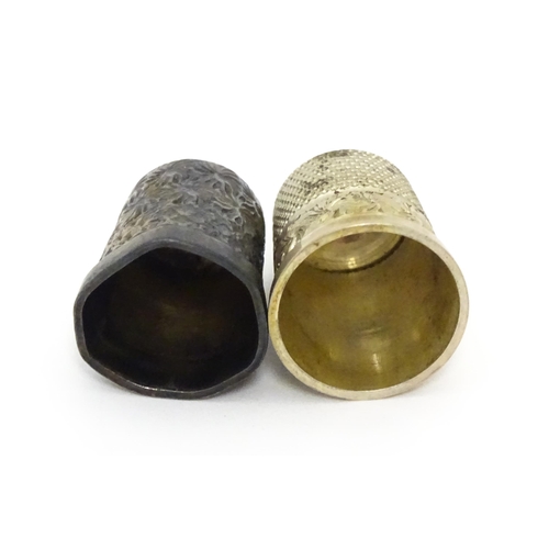 387 - Two silver thimbles, to include one hallmarked Birmingham 1912, maker James Swann (TW approx. 7.8g)(... 