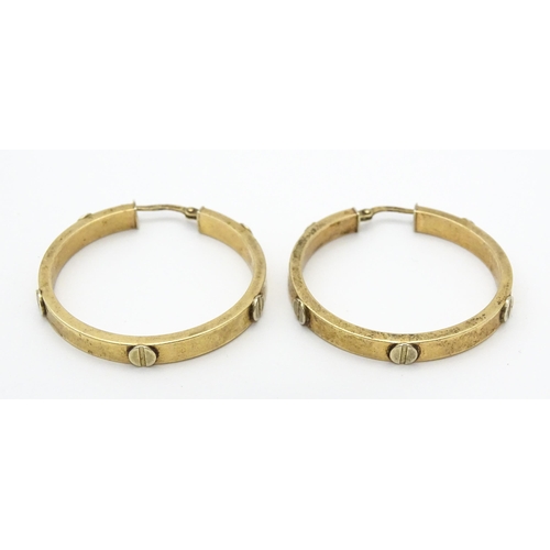 732 - A pair of 9ct gold hoop earrings. Approx. 1 1/4