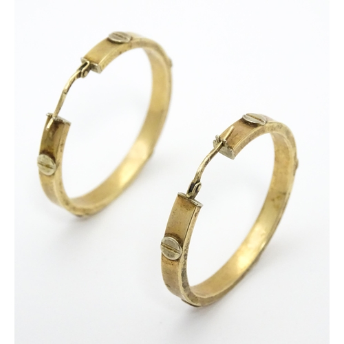 732 - A pair of 9ct gold hoop earrings. Approx. 1 1/4