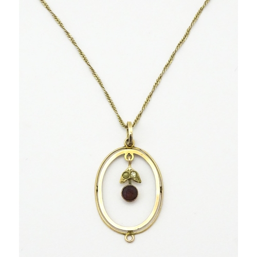 743 - A 9ct gold pendant with amethyst and white stone detail, on a 9ct gold chain with twist detail. Toge... 