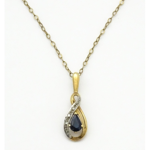 743 - A 9ct gold pendant with amethyst and white stone detail, on a 9ct gold chain with twist detail. Toge... 