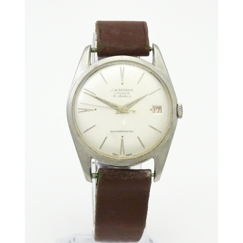 812 - A 1960s gentleman's wristwatch by J W Benson, the dial with hour batons and date aperture. With case... 