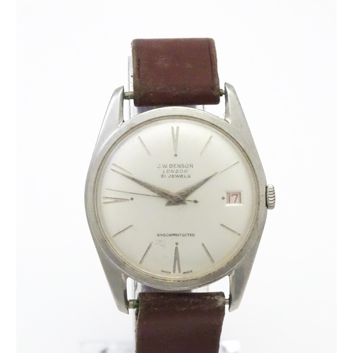 812 - A 1960s gentleman's wristwatch by J W Benson, the dial with hour batons and date aperture. With case... 