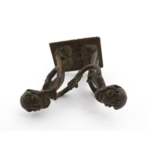 1049 - Three assorted items to include an Indian cast brass Nandi idol modelled as a recumbent bull with st... 