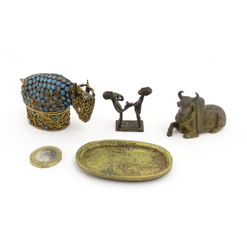 1049 - Three assorted items to include an Indian cast brass Nandi idol modelled as a recumbent bull with st... 