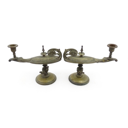 1052 - A cast brass candlestick formed from a Victorian oil lamp. Approx. 6 1/2