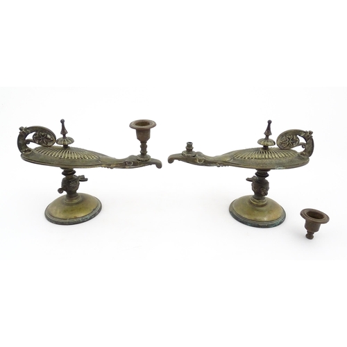 1052 - A cast brass candlestick formed from a Victorian oil lamp. Approx. 6 1/2