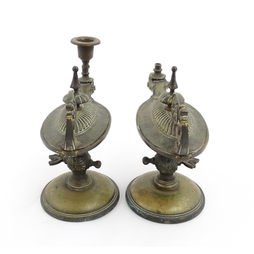 1052 - A cast brass candlestick formed from a Victorian oil lamp. Approx. 6 1/2