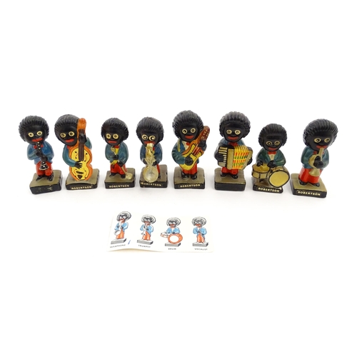 1082 - Eight ceramic hand painted Robertson jam advertising band figures comprising Saxophone, Trumpet, Dru... 