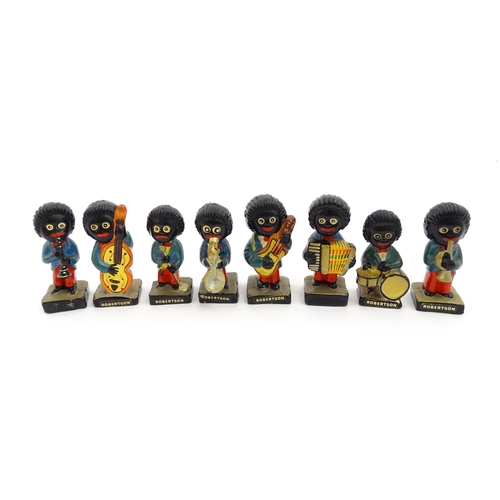 1082 - Eight ceramic hand painted Robertson jam advertising band figures comprising Saxophone, Trumpet, Dru... 