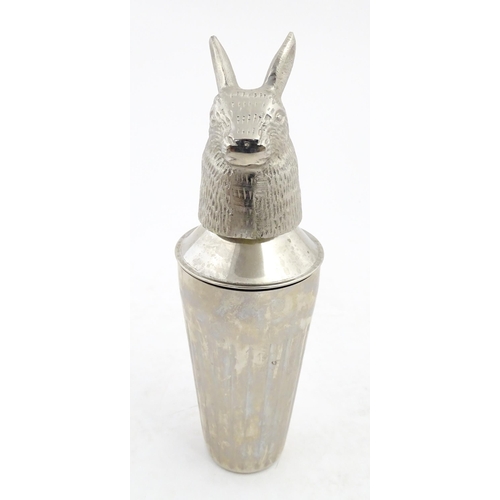 1085 - A late 20th / early 21stC novelty cocktail shaker with hare / rabbit formed lid. Approx. 12