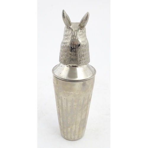 1085 - A late 20th / early 21stC novelty cocktail shaker with hare / rabbit formed lid. Approx. 12