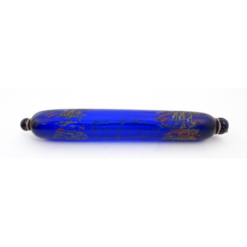 1088 - Naval Interest: A 19thC Bristol blue glass rolling pin bearing the motto 'Love & Live Happy' with sh... 