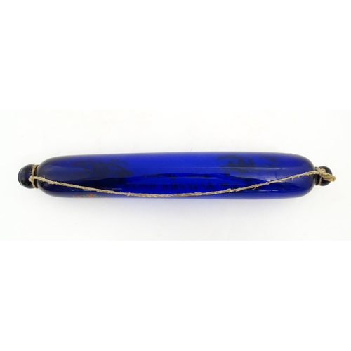 1088 - Naval Interest: A 19thC Bristol blue glass rolling pin bearing the motto 'Love & Live Happy' with sh... 