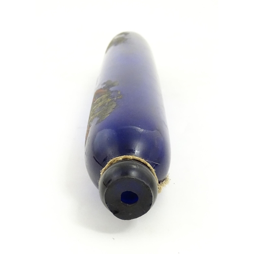 1088 - Naval Interest: A 19thC Bristol blue glass rolling pin bearing the motto 'Love & Live Happy' with sh... 