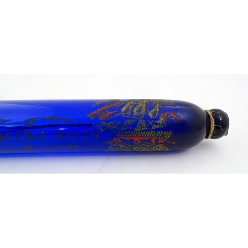 1088 - Naval Interest: A 19thC Bristol blue glass rolling pin bearing the motto 'Love & Live Happy' with sh... 