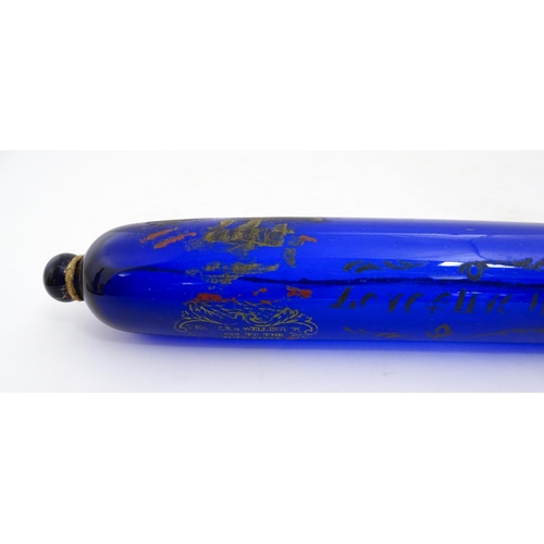 1088 - Naval Interest: A 19thC Bristol blue glass rolling pin bearing the motto 'Love & Live Happy' with sh... 