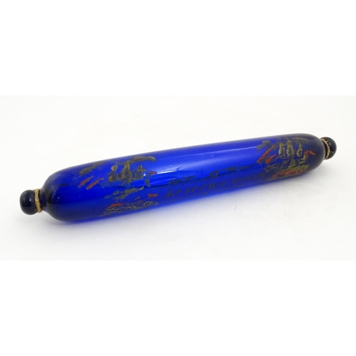 1088 - Naval Interest: A 19thC Bristol blue glass rolling pin bearing the motto 'Love & Live Happy' with sh... 