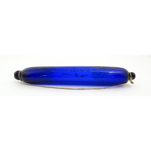 1088 - Naval Interest: A 19thC Bristol blue glass rolling pin bearing the motto 'Love & Live Happy' with sh... 