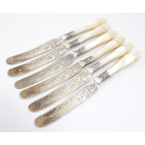 1090 - A cased set of silver plate fish eaters with mother of pearl handles and silver collars. Case approx... 