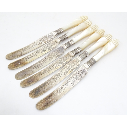 1090 - A cased set of silver plate fish eaters with mother of pearl handles and silver collars. Case approx... 