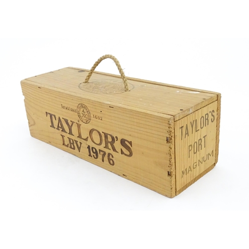 1091 - A cased magnum bottle of Taylor's 1976 vintage port, the box approx 14