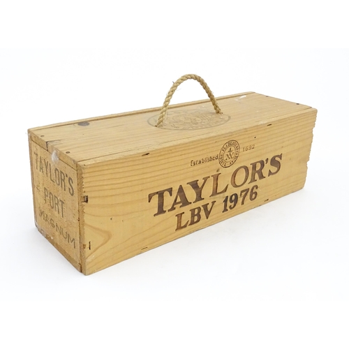 1091 - A cased magnum bottle of Taylor's 1976 vintage port, the box approx 14