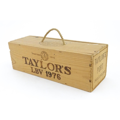 1091 - A cased magnum bottle of Taylor's 1976 vintage port, the box approx 14