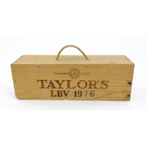 1091 - A cased magnum bottle of Taylor's 1976 vintage port, the box approx 14