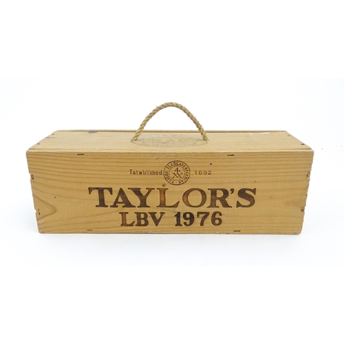 1091 - A cased magnum bottle of Taylor's 1976 vintage port, the box approx 14