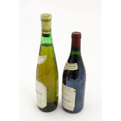 1093 - A 70cl bottle of Les Maitres Goustiers Beaujolais Villages 1985 red wine, together with a 75cl bottl... 