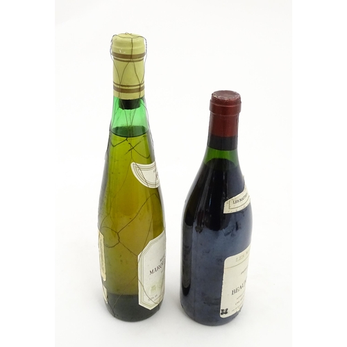 1093 - A 70cl bottle of Les Maitres Goustiers Beaujolais Villages 1985 red wine, together with a 75cl bottl... 