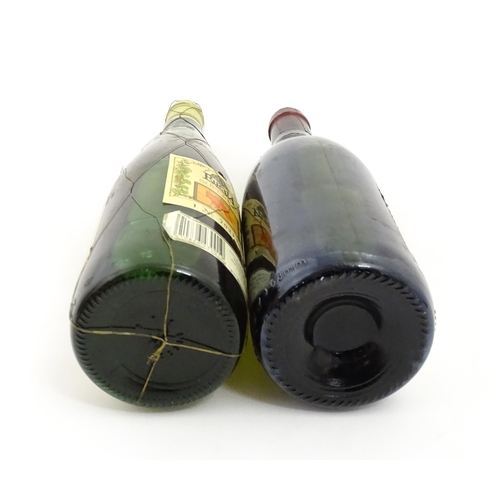 1093 - A 70cl bottle of Les Maitres Goustiers Beaujolais Villages 1985 red wine, together with a 75cl bottl... 