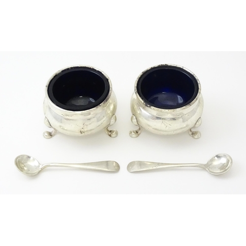 249 - A pair of Canadian Birks Sterling silver salts and matching spoons. Salts approx 2