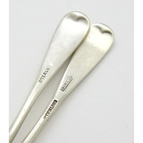 249 - A pair of Canadian Birks Sterling silver salts and matching spoons. Salts approx 2