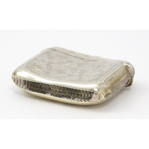 272 - A silver vesta case with engraved foliate decoration.  Hallmarked Birmingham 1909, maker Samuel M Le... 