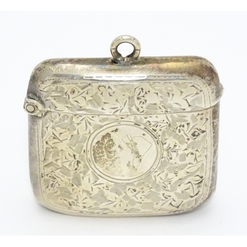 272 - A silver vesta case with engraved foliate decoration.  Hallmarked Birmingham 1909, maker Samuel M Le... 