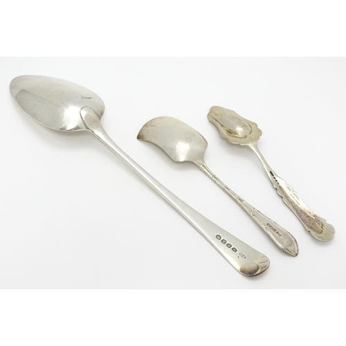 278 - A silver tablespoon hallmarked London 1805, maker Thomas Dicks. Together with two sugar shovels / sp... 