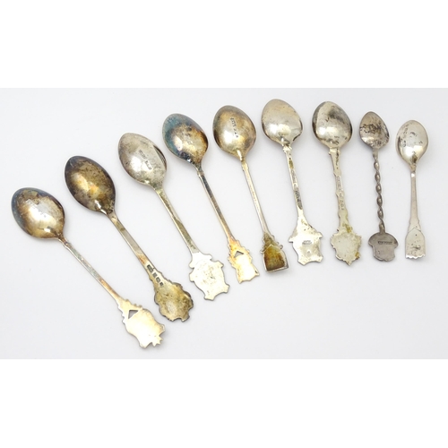 404 - A quantity of assorted silver souvenir teaspoons from Great Britain and Channel Islands, examples to... 