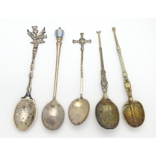 409 - Five assorted hallmarked silver spoons to include two silver gilt examples modelled as anointing spo... 