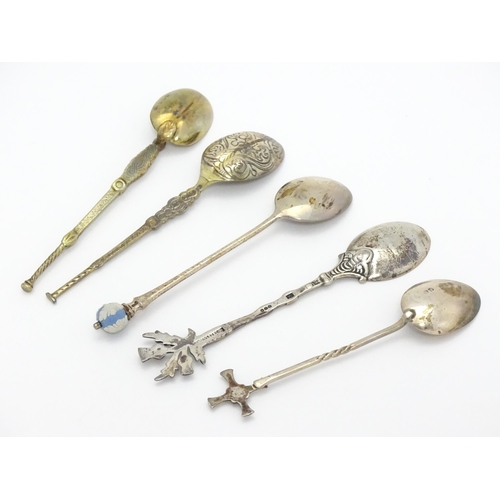 409 - Five assorted hallmarked silver spoons to include two silver gilt examples modelled as anointing spo... 