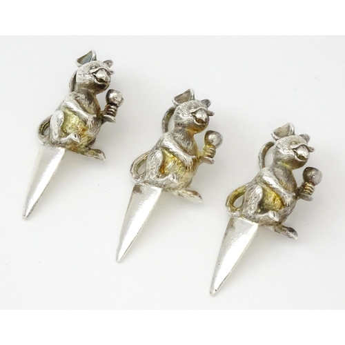 432 - Three novelty white metal cheese picks / markers in the form of mice. Approx. 1 3/4