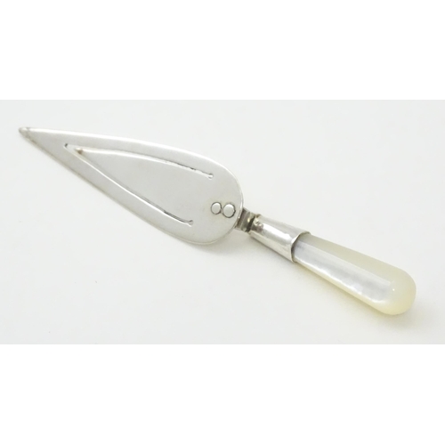 448 - A silver page marker of trowel form with mother of pearl handle, hallmarked London 1985, maker Ari D... 