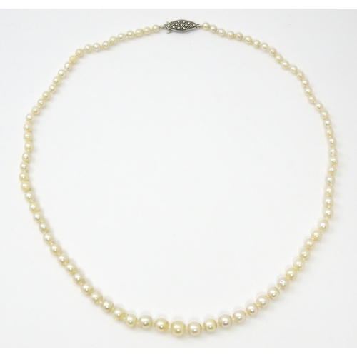 748 - A cultured pearl single necklace with silver  and marcasite clasp. Approx 18