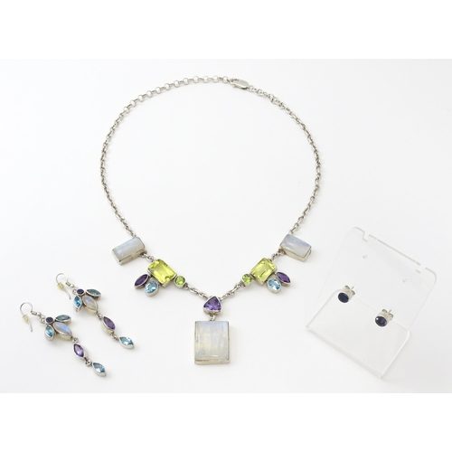 756 - A silver necklace and matching drop earrings set with various semi precious stones, together with a ... 