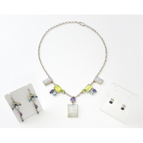 756 - A silver necklace and matching drop earrings set with various semi precious stones, together with a ... 