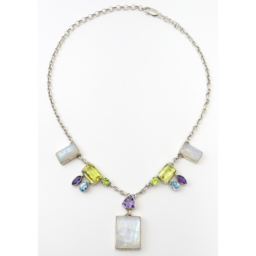 756 - A silver necklace and matching drop earrings set with various semi precious stones, together with a ... 