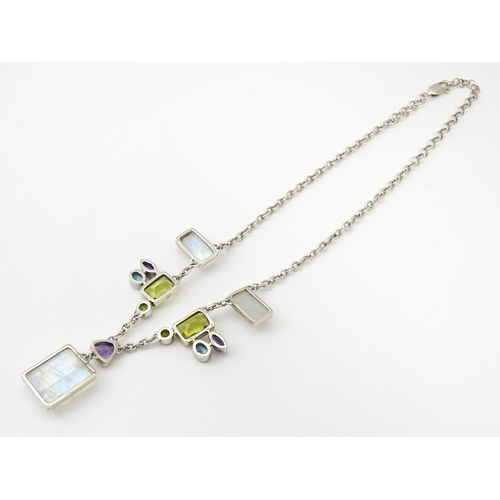 756 - A silver necklace and matching drop earrings set with various semi precious stones, together with a ... 