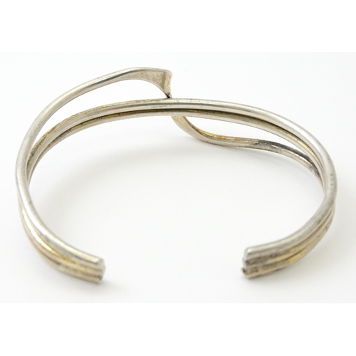 757 - Six silver and white metal bracelets to include one of bangle form with engraved decoration hallmark... 