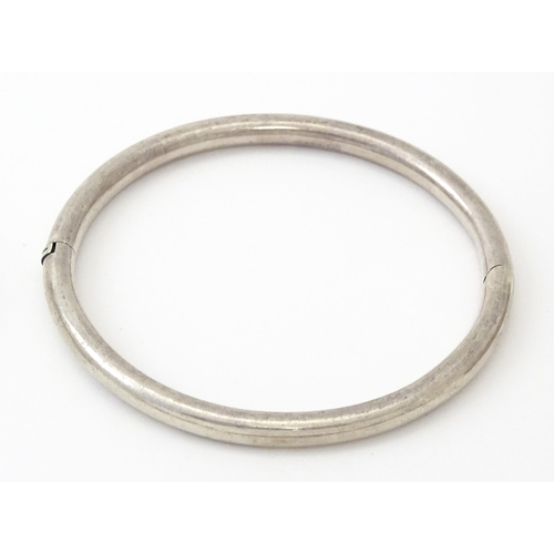 757 - Six silver and white metal bracelets to include one of bangle form with engraved decoration hallmark... 